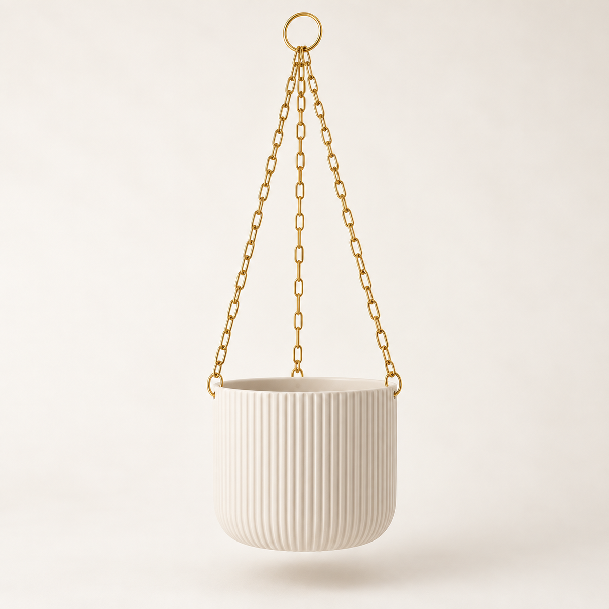 White ribbed hanging pot with a gold-colored chain